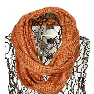 Infinity loop knit scarf, orange, sequins, crocheted yarn